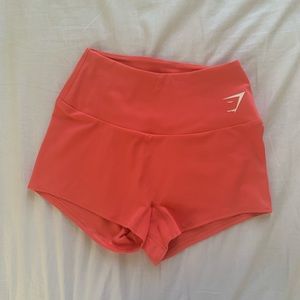 Coral pink gym shark shorts